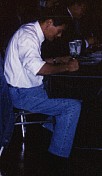 Chow signing an autograph